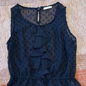 Sheer blue tank top.